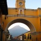 Antigua's Arch and in the back, Agua Volcano