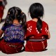 Little children using their own traditional clothes in Chichicastenango